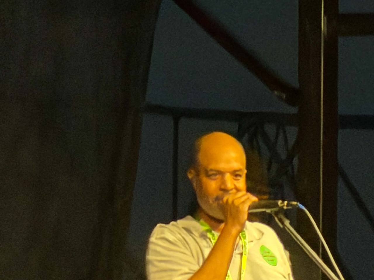 Mastamynd speaking on an Ohio cannabis community event stage